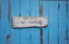 I spotted this photograph whilst walking can to my car after spending some time photographing the beautiful fishing village of Polperro.  I loved the way the neglect had created the textures the door and sign.