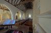 This is a photograph of inside St Mary's church Aldworth.  The church has a history dating back to the 11th century.