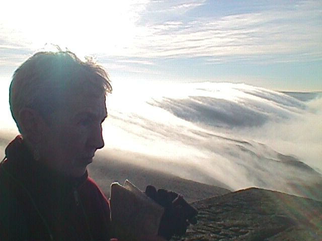 Stoodley Pike Todmorden - early morning mist rapidly rolling over edge.