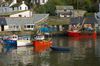 This is Polperro harbour in Cornwall, a very beautiful fishing village.  The local people are friendly and have a warm welcome for all.  The village is a rich canvas for any photographer throughout the year.  For more information please go to the following website.